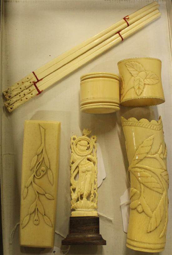 Indian carved ivory Krishna, African tusk vase, similar box & cover, napkin rings & sundries